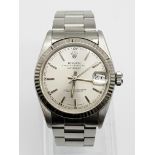 A Rolex Perpetual Datejust Ladies Watch. Stainless steel strap and case -31mm. Silver tone dial.
