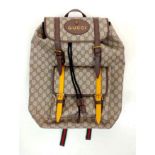 A GUCCI FULL SIZE BACKPACK IN GOOD CONDITION