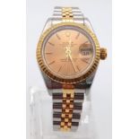 A Rolex Oyster Perpetual Datejust Ladies Watch. Bi-metal jubilee strap and case - 26mm. Gold tone