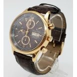 A Christian Jacques Automatic 18K Gold Gents Chronograph Watch. Crocodile leather strap. 18k gold