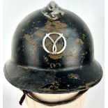 A WW2 French Milice Helmet. A French political paramilitary organization that fought to bring down