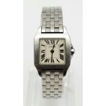 A Cartier Stainless Steel Small Tank Watch. Case - 20 x 30mm. White dial. Quartz movement in working