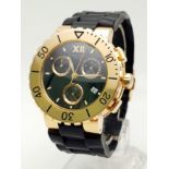 A Chaumet of Paris 645B 18K Yellow Gold Chronograph Gents Watch. Black rubber strap with 18k gold