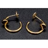 A pair of 18k yellow gold Cartier Juste un Clou hoop earrings. Width: 1.8mm. Inner diameter: 12.