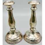 Two Antique Silver Candlesticks. 349g total weight. 23cm tall.