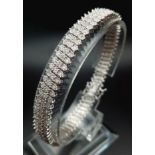 A VERY PRETTY 9K WHITE GOLD WITH 3 ROWS OF DIAMOND SET BRACELET, WITH APPROX 1.50CT DIAMONDS, WEIGHT