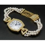 A Must de Cartier 18K Gold Diamond and Pearl Ladies Watch. Pearl, diamond and gold bracelet. Gold