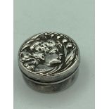 Antique extremely rare and very small SILVER PILL/SNUFF BOX. Having Repousse Face in profile to top.