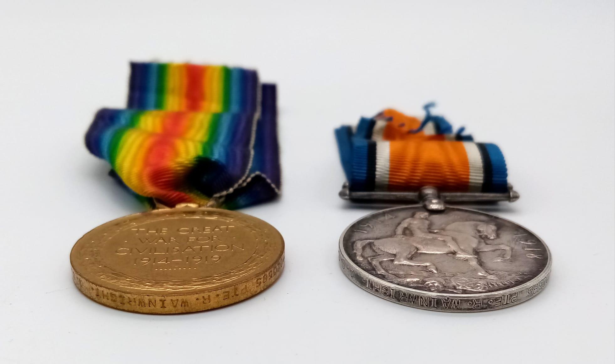 A WW1 British Medal Trio in a Princess Mary Christmas Gift Tin. Awarded to: M2-020585 Pte R. - Image 4 of 5