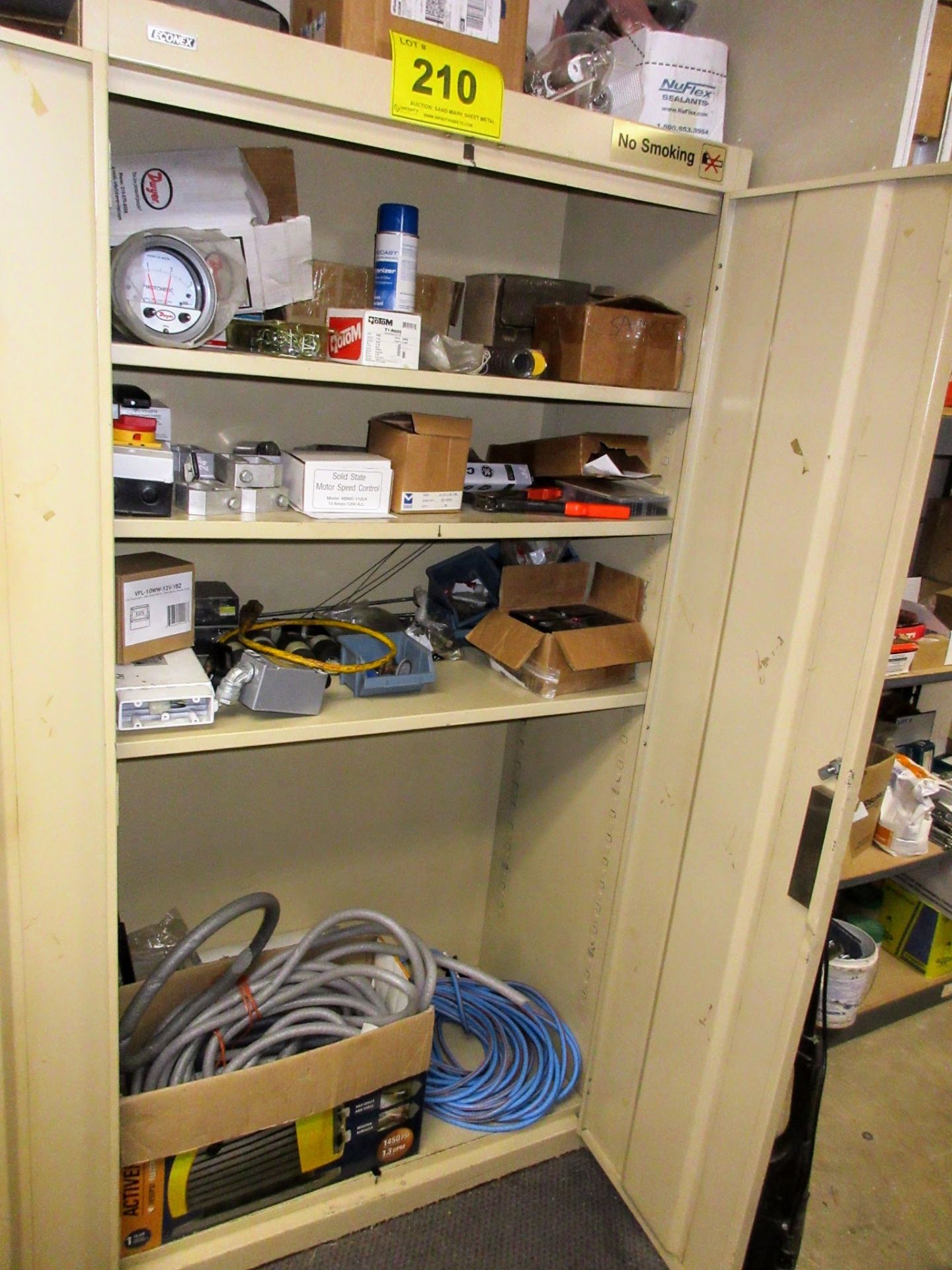 2-DOOR STORAGE CABINET W/ CONTENTS AND (2) BOXES OF INSULATING STRIPS ON LEFT, ELECTRICAL