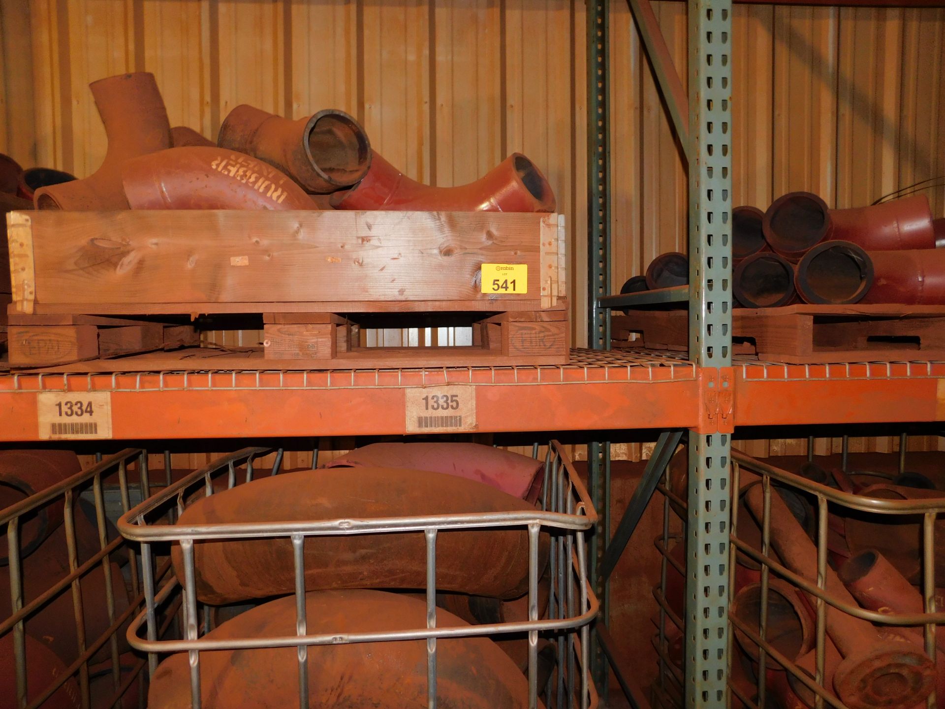 pallet racking with assorted pipe fittings