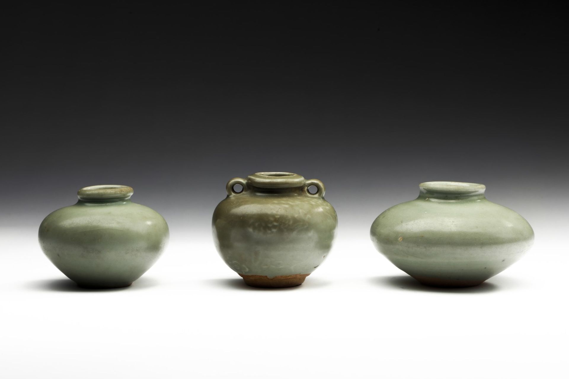 Arte Cinese  Three celadon glazed pottery containers China, Song dynasty (960-1279) .