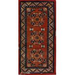 . A Tibetan rug decorated with chevron in the border early 20th century .