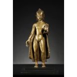 Arte Indiana A copper alloy standing Buddha figure in the late Gupta styleIndia, late 19th century