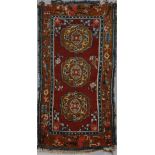 . A floral decorated rug Tibet, 19th century .