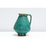 Arte Islamica A turquoise glazed pottery jug Iran, 12th-13th century .