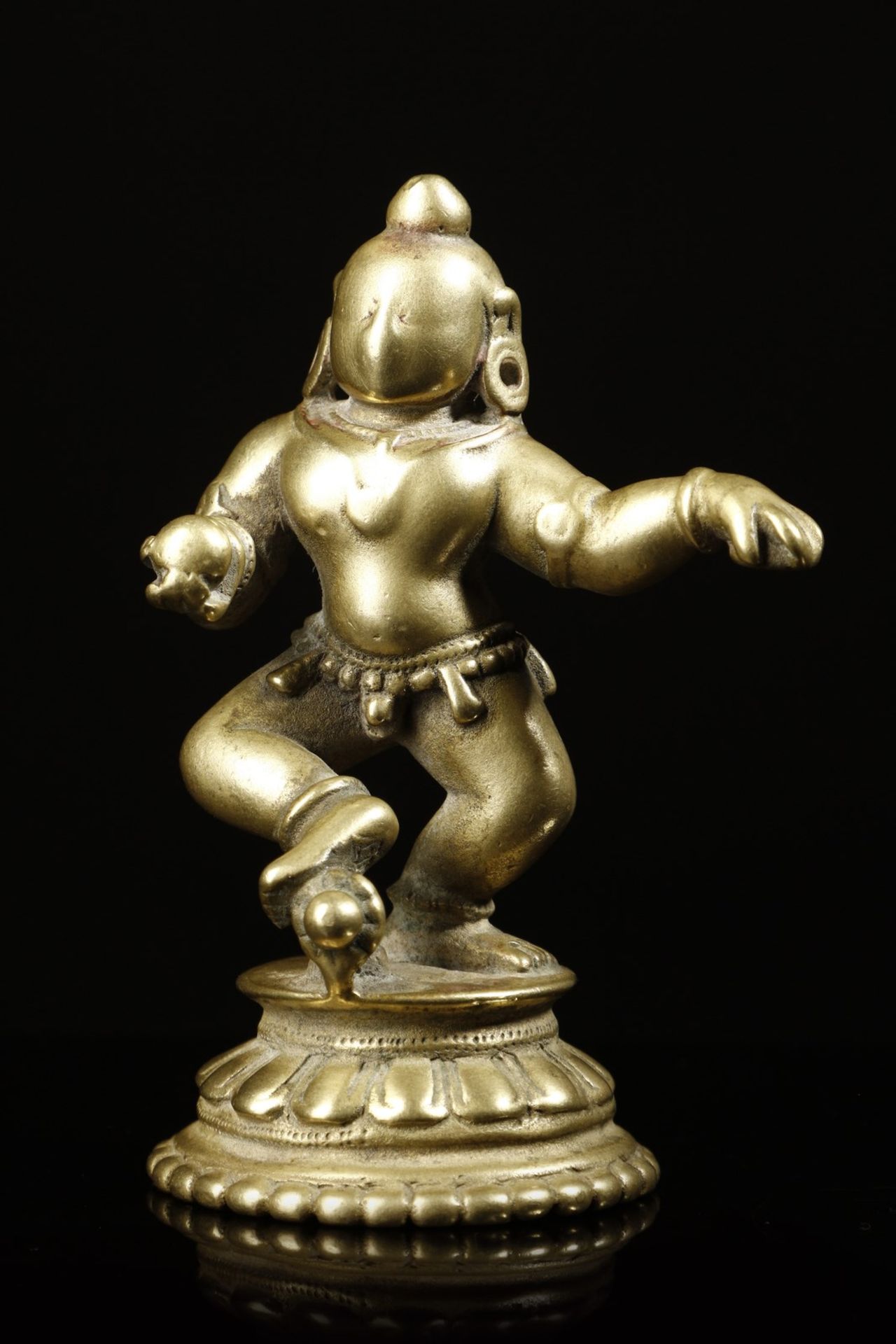 Arte Indiana A brass BalaKrishna figure India, Orissa, 17th century .