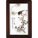 Arte Cinese A porcelain plaque painted with a bird on a blossoming branch China, Republic period .