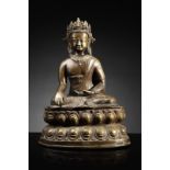 Arte Himalayana A large bronze figure of crowned Buddha Tibet, early 20th century .