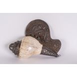 Arte Himalayana A ritual conch with silvered metal endings incrusted with coral and turquoise stone