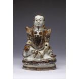 Arte Cinese A Cizhou pottery figure of seated GuandìChina, Qing dynasty, 19th century .