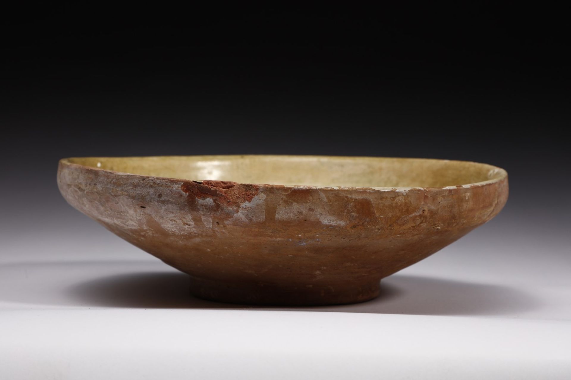 . An earthenware bowl incised with central sun Middle East or Cyprus, possibly Byzantine period .