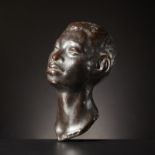AUTORE NON IDENTIFICATO Sculpture.Head of an African boy. Porcelain stoneware.