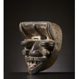 Guerè/ We - Liberia Von Gla mask.Hardwood with dark patina, metal pigments and kaolin.Signs of use.