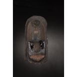 Dogon - Mali Black monkey mask.Hardwood with dark patina, bitumen and pigments, animal hair and fi