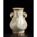 A framboise porcelain archaic style vase China, late 19th century Cm 12,00 x 17,00