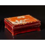 A wooden lacquered box and cover decorated with mother-of-pearl inlays Japan, Meiji period, 19th