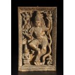 A large wooden carved frieze depicting a dancing deity Southern India, 19th century Cm 57,00 x 97,