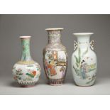 A group of three porcelain vases with polychrome decoration China, 20th century Cm 47,00