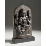 A black stone stele depicting Karttikeya Northern India/Kashmir, 19th century or earlier Cm 23,50