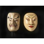 A pair of Noh theatre masks Japan, Taisho period, early 20th century Cm 13,00 x 19,00