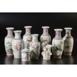 A group of nine porcelain items China, 20th century Including: 7 baluster vases; a Dehua porcelain