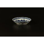 A blue and white porcelain dish with lobed rim and spurious Chenghua mark at the base China, Qing