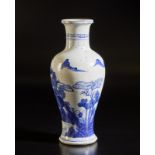 A blue and white porcelain baluster vase bearing a spurious six character Kangxi mark at the base