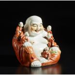 A Budai porcelain group figure China, 20th century Cm 25,00 x 22,00