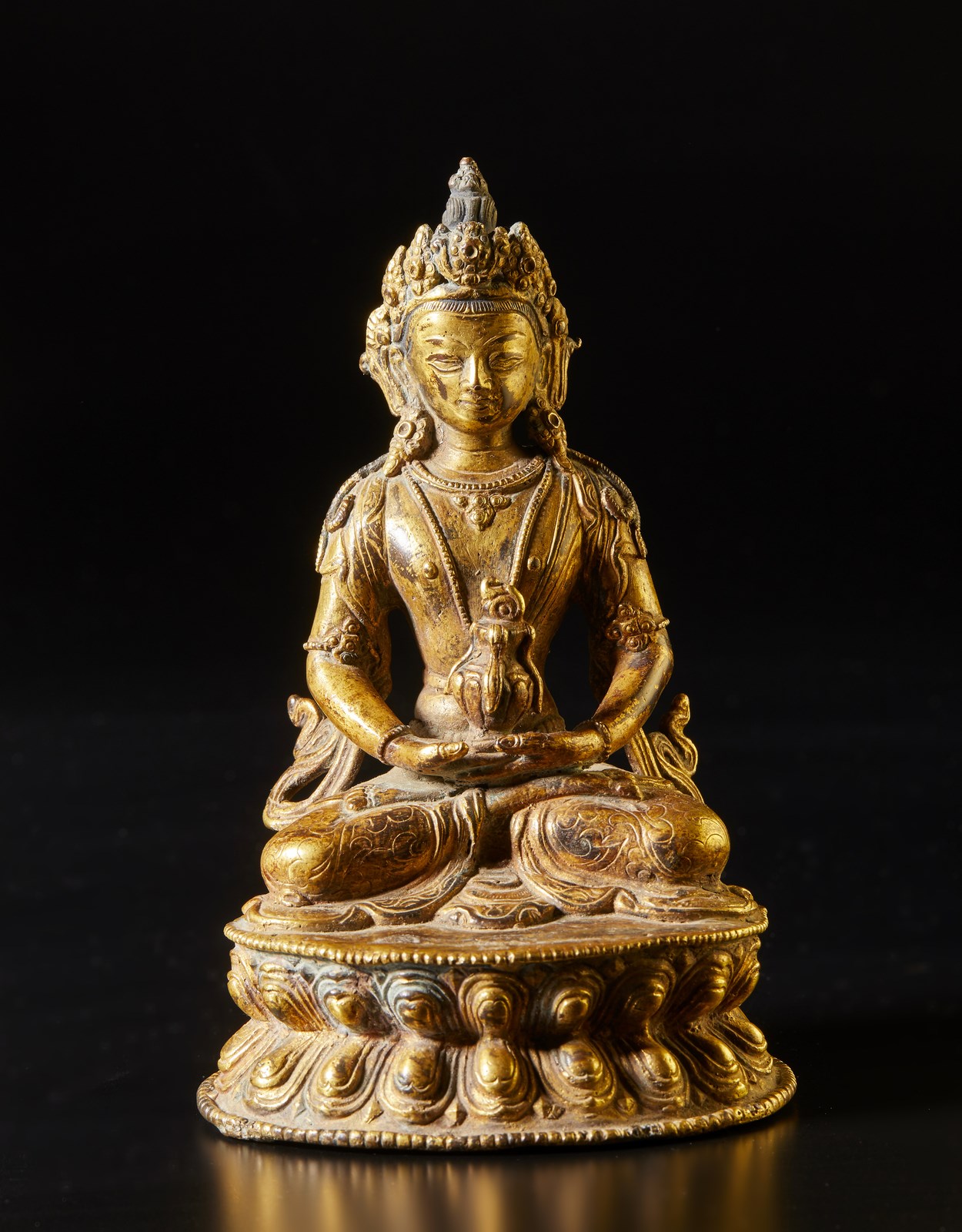 A gilt bronze figure of Buddha Amitayus Tibet, 19th century Cm 11,00 x 17,00