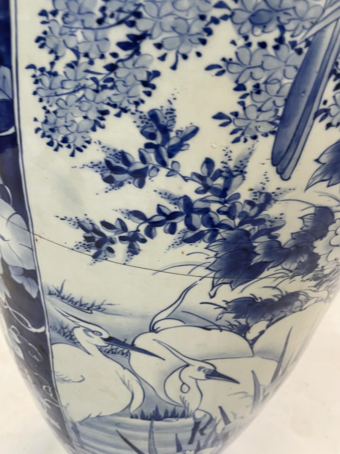 A large Japanese floor standing vase, of baluster form, decorated storks, Iris and other foliage, - Image 5 of 18