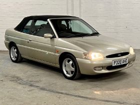 1996 Ford Escort Cabriolet Si Registration number P320 AHO Metallic gold Alloy wheels Just over 81,