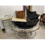 A vintage Silver Cross pram, 130 cm wide One of the belts on the suspension has split, used