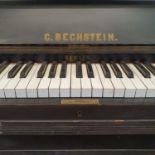 A Bechstein ebonised upright piano, 150 cm wide Note: With ivory exemption certificate enabling sale