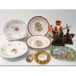 A set of four 19th century porcelain oval bowls, decorated flowers, 26 cm wide, three oval plates,