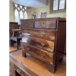 A mahogany chest, having two short and three long drawers, 76 cm wide, a trolley, and a standard