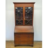 A mahogany bureau bookcase, 95 cm wide Various scratches, small losses etc