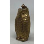 A novelty brass sovereign holder, in the form of an owl Condition good, a 20th/21st century copy