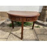 A mahogany demi lune table, 93 cm wide, an oak compactum, an oak desk chair, three chairs and a
