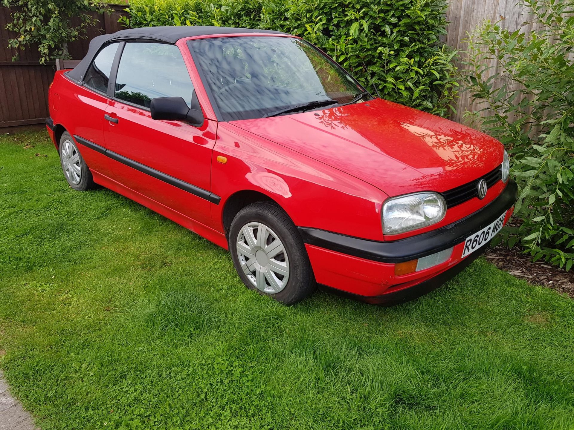 1997 VW Golf Cabriolet Best bid to be submitted Registration number R606 MGH Red with grey